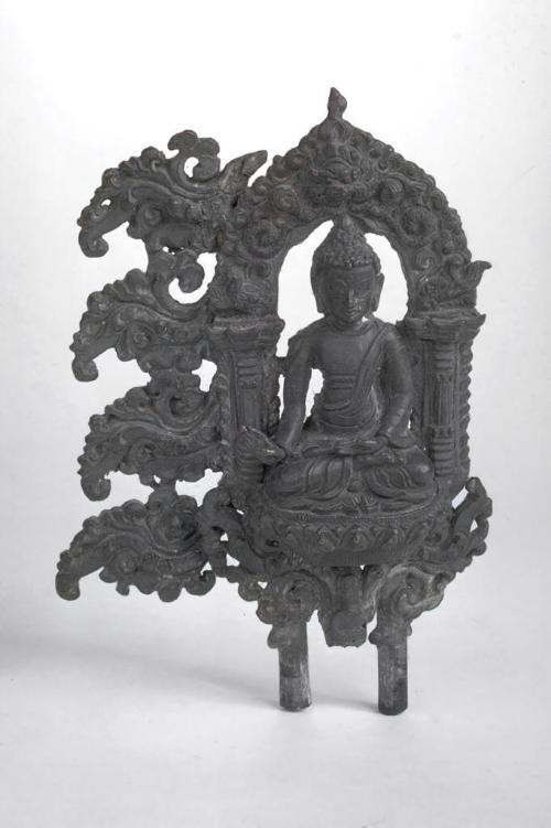 Fragment of halo with a seated Buddha