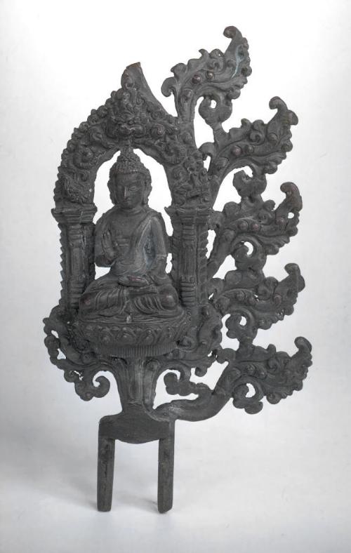 Fragments of halo with seated Buddha