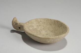 Dish with zoomorphic handle