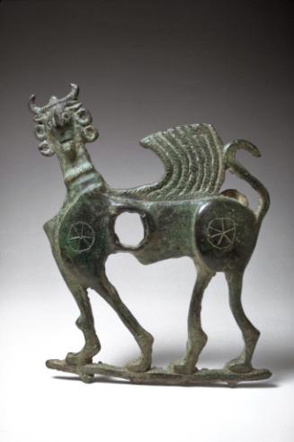 Cheekpiece of a horse bridle in the form of a winged sphinx