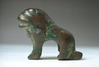 Seated lion-shaped finial