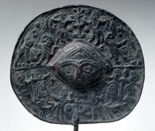 Disk-headed votive pin with iconographic scenes