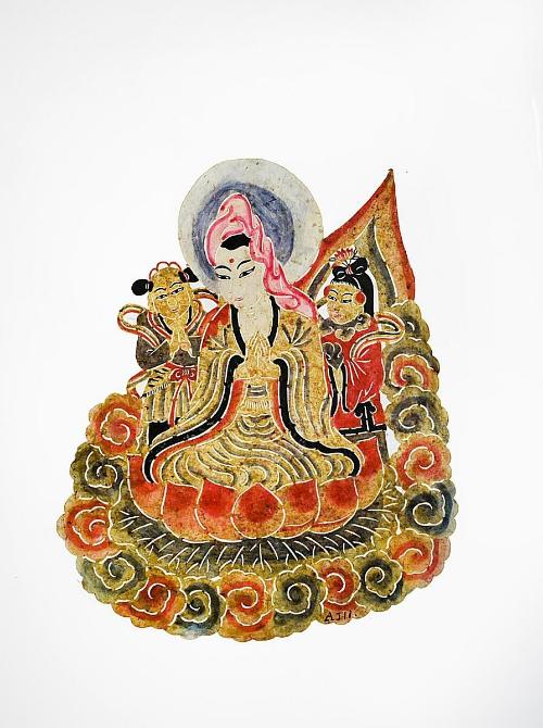 Guanyin on lotus with two attendants