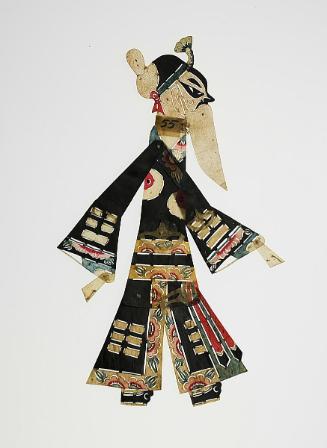 Bearded male figure in black robe with floral design