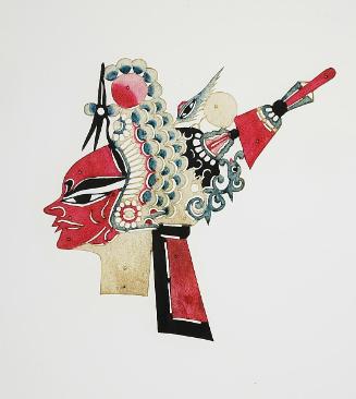 Red-faced head wearing headdress with red point