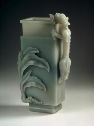 Vase with evergreen and dragon