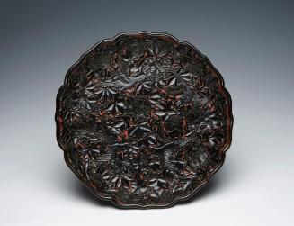 Plate with flying birds amid flowers