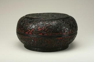 Lidded box with a scene of two lions playing with balls