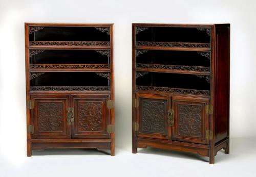 Small chest with three shelves and two doors, one of a pair