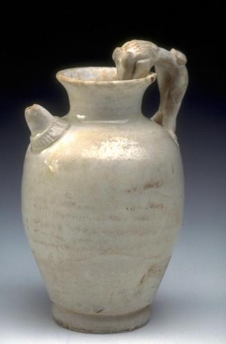 Ewer with hand-formed spout and dragon handle