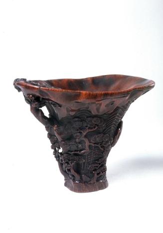 Goblet with carved figures in landscape