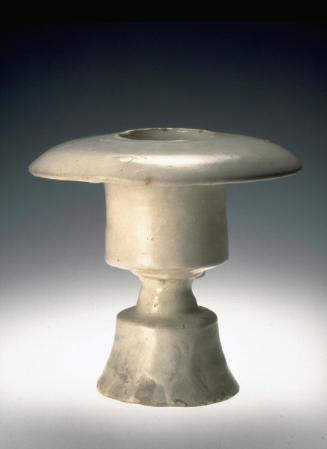 Incense-burner on a high, hollow pedestal