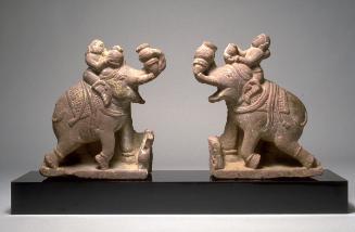 Elephant with rider, one of a pair