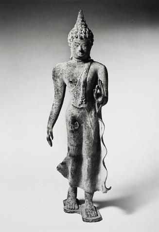 Forgery of a Sukhothai-style walking Buddha