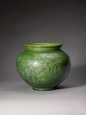 Jar with incised floral design