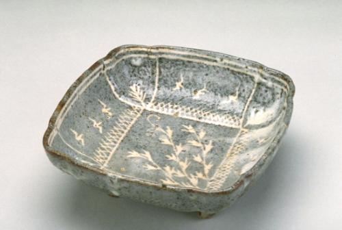 Square dish with plant and bird design