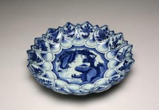 Lobed dish with water scene