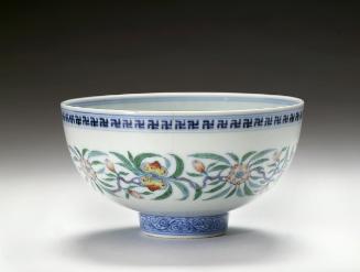 Bowl with peach blossoms and swastikas