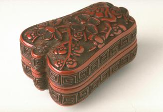 Fan-shaped box with floral design