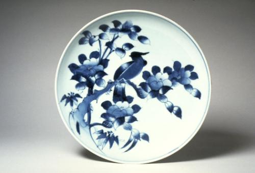 Plate with design of a bird on a camellia branch