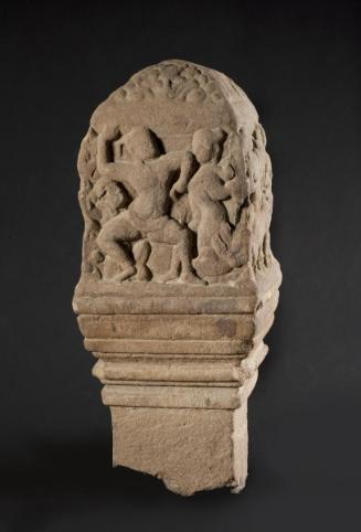 Upper section of a ceremonial path marker with scenes of Krishna conquering animal demons