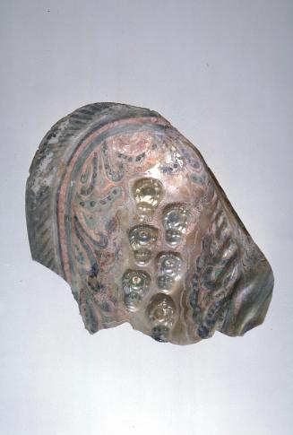 Oyster shell with six cultured images of Maitreya, the buddha of the future