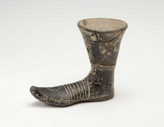 Boot-shaped drinking vessel