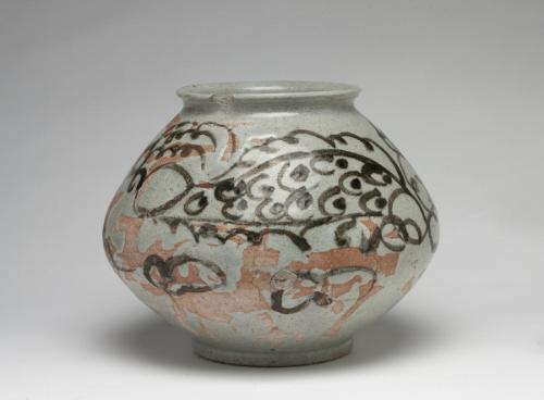 Jar with dragon design