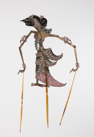 A female character with a black face, perhaps Srikandi