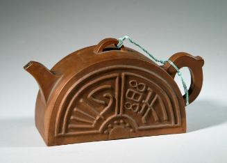 Teapot in the shape of an ancient tile