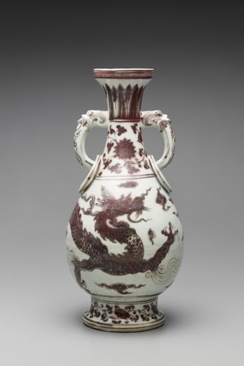 Vase with design of dragons amid clouds