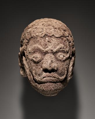 Head of a mythological figure