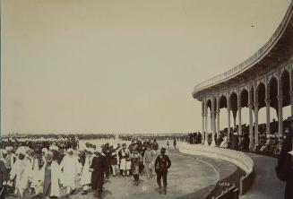 Ceremonial scene with procession of Indian men