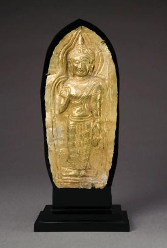 Relief of standing Buddha