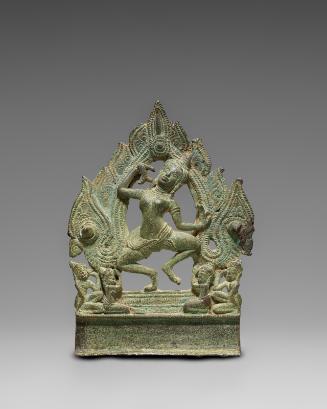 Dancing goddess with worshippers