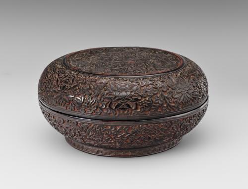 Covered box with flower and insect motifs