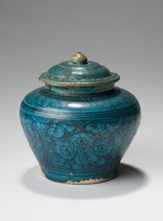 Covered jar with floral design